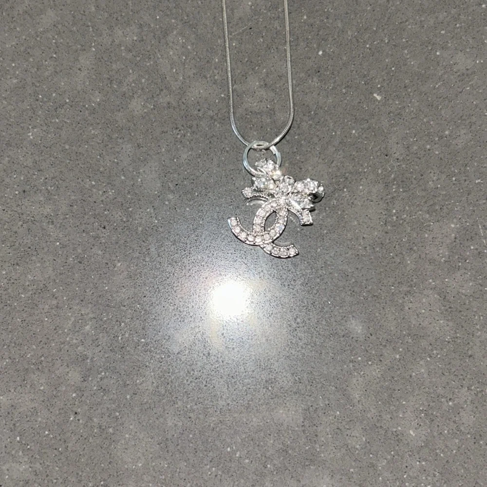 Chanel silver CC bow necklace (hallmark on back)
